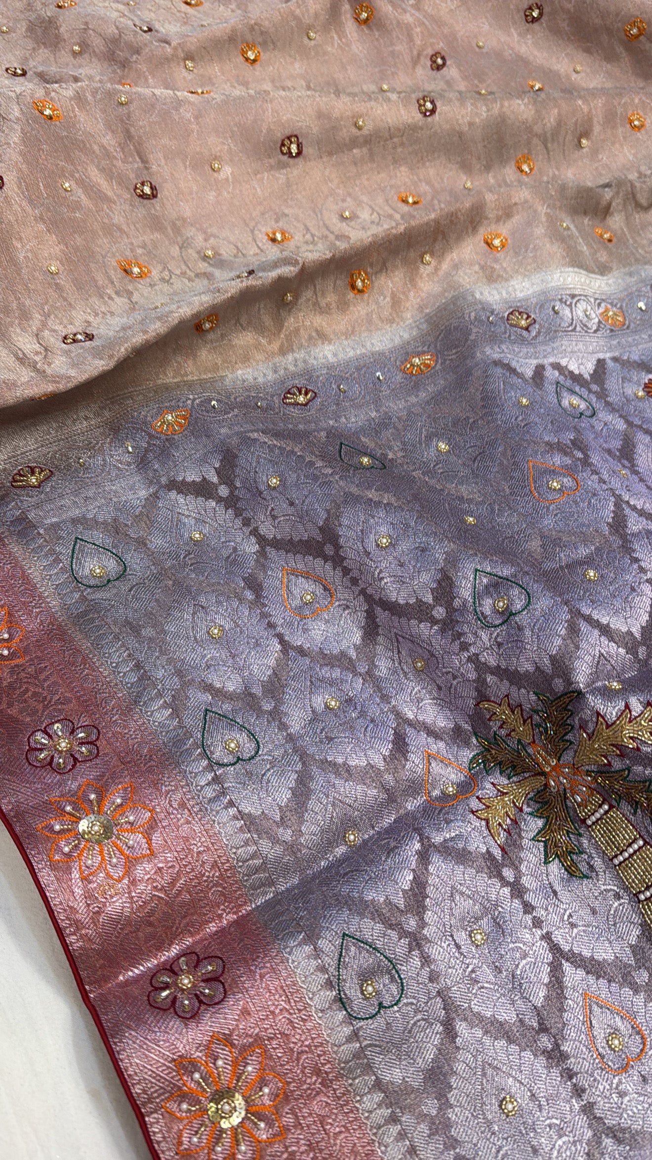 Dusty lilac tissue brocade shreenathji motif hand embroidered kadhwa saree